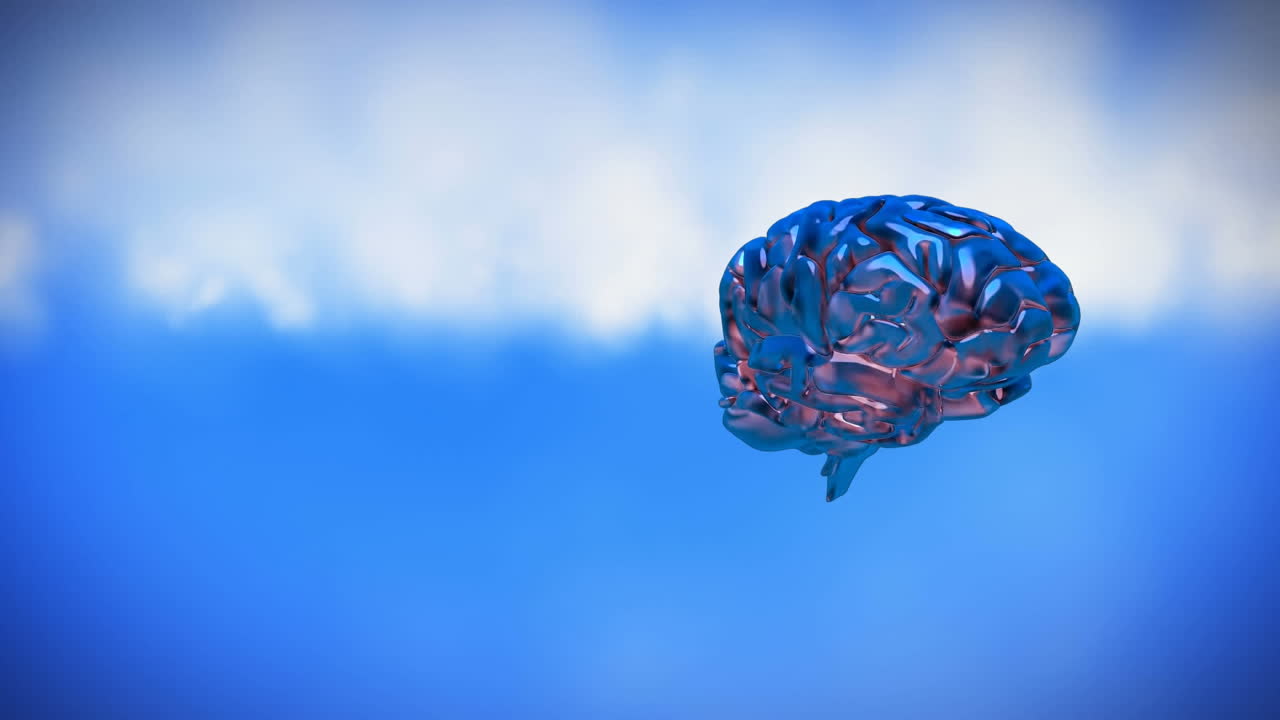 Spinning iron brain on a sky background