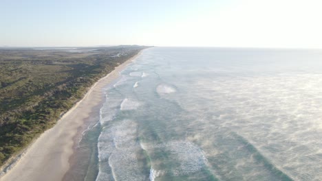 Mist-Rising-Over-The-Cold-Water-Of-Sea-In-Coolum-Beach-In-Early-Morning-In-QLD,-Australia