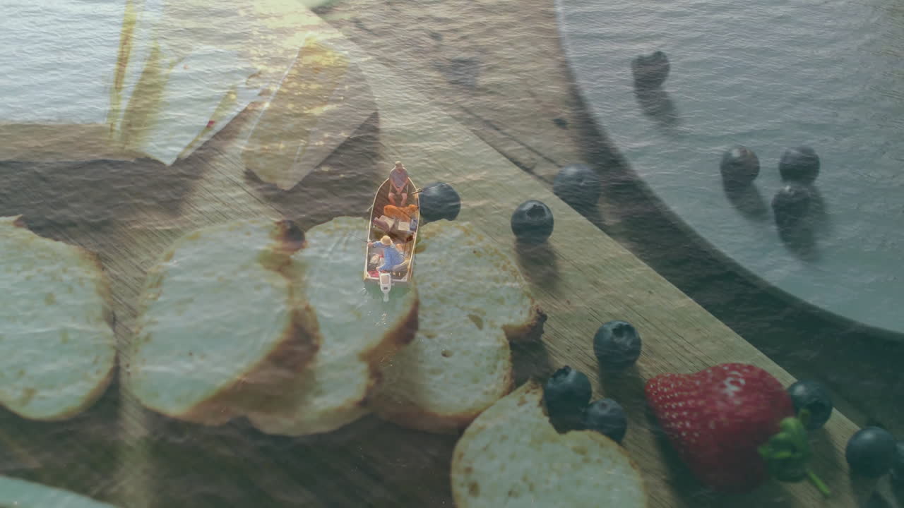 Floating over sliced bread and berries, small boat with people creating animation