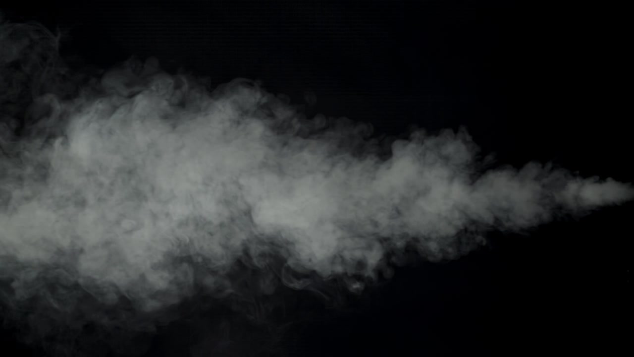 Slow Motion White Smoke Stream on Black Background