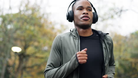 health, running and music with black man in park