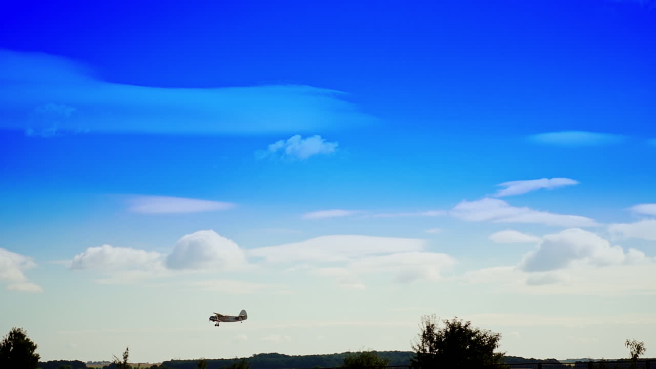 Vintage Airplane in a Blue Sky
