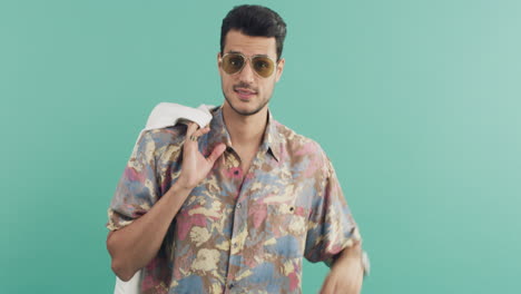 trendy man in hawaiian shirt and sunglasses