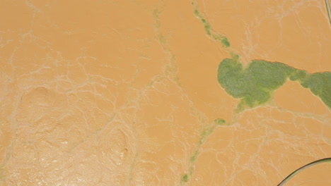 waste water treatment plant abstract aerial top shot over water tank