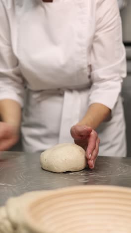 chef kneading dough