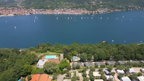 Beautiful-drone-shot-Lake-Garda-and-mountains-in-background-in-Italy