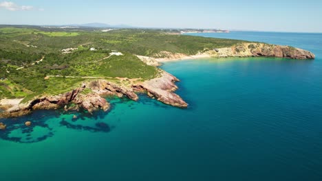 panorama of seascape and verdant hills in summer. - aerial shot