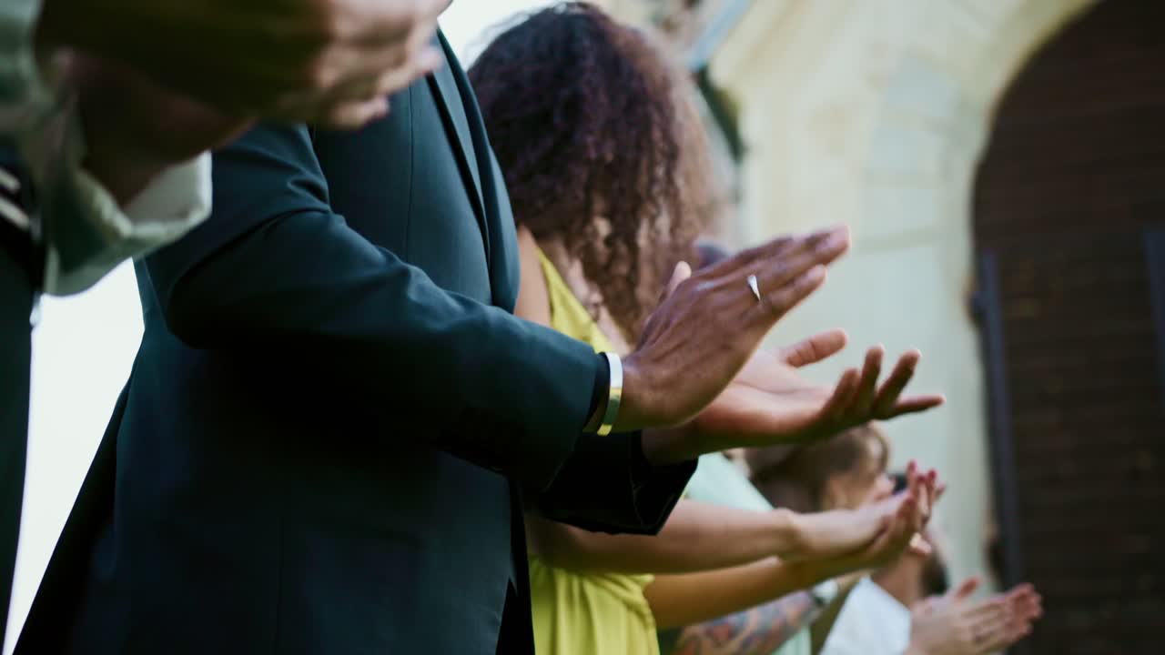 People applauding at an event