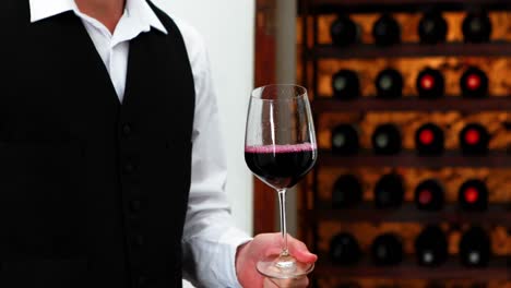 male waiter pouring wine into wine glasses 4k