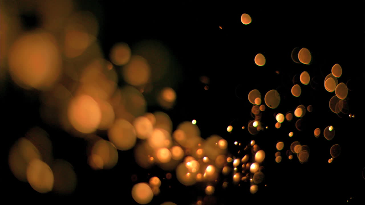 puntos brillantes que fluyen en movimiento súper lento