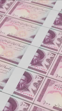 video vertical de billetes de 100 riales iraníes impresos por una imprenta de dinero