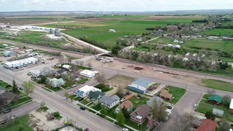 Old-west-Wheatland-Wyoming-on-the-way-to-Casper-Wyoming-aerial-showing-power-plant-and-green-grass-during-spring-2021