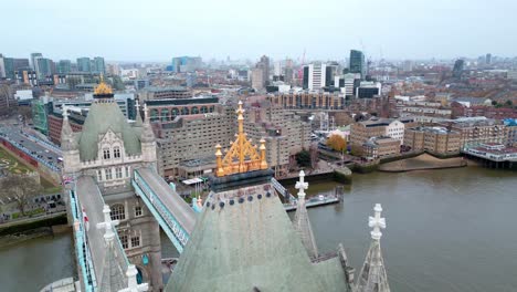 orbital drone shot of the highest part of the tower bridge in london, england, during the day