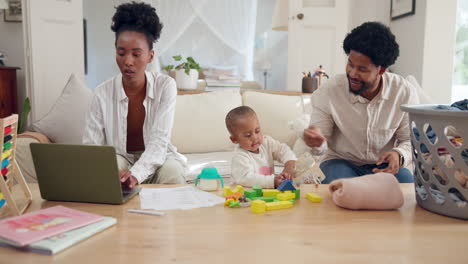 family working from home with child playing at the table