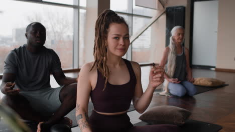 group meditation session with incense