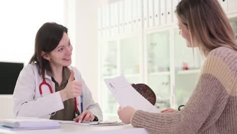 doctor and patient interacting during a medical consultation in a clinic