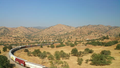 A-Union-Pacific-train-rolls-through-the-Souther-California-landscape---aerial-view