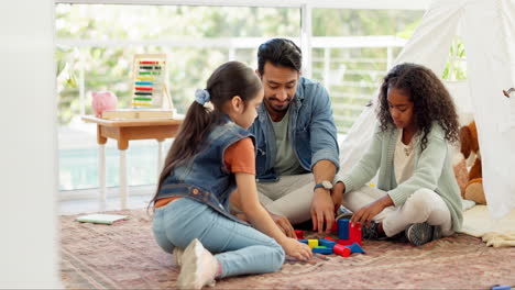 Building-blocks,-father-and-girls-play