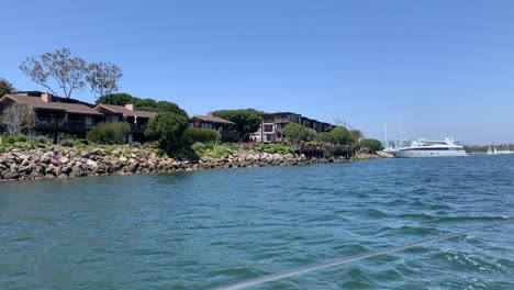 sailing-boat-through-large-marina