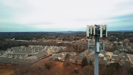 aerial tilting shot of cell phone tower