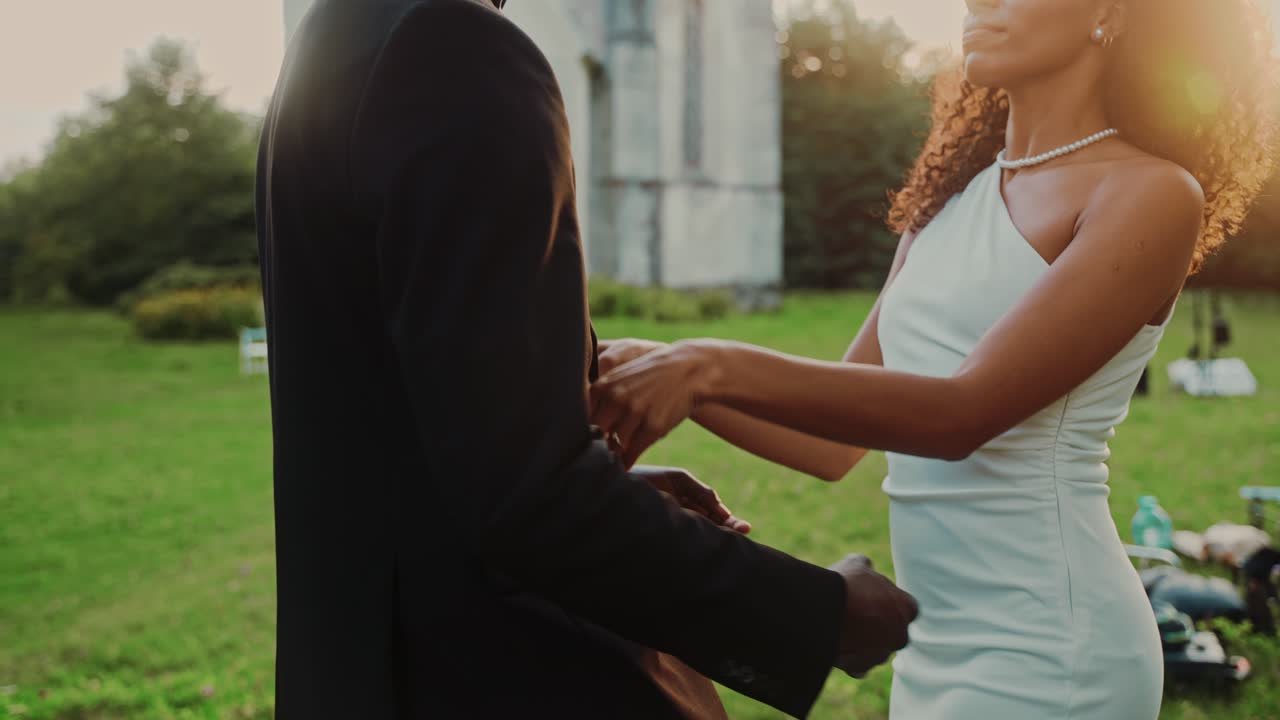 A beautiful couple celebrating their wedding day in a romantic outdoor setting
