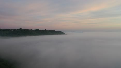 misty sunrise/sunset over valley