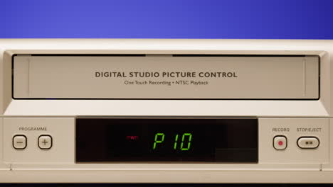 vintage vhs player with hand