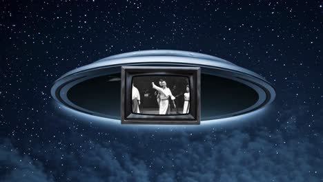 vintage dancing people on a retro tv inside a ufo