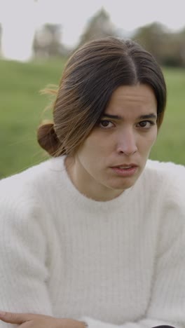a woman expressing a range of emotions in an outdoor setting