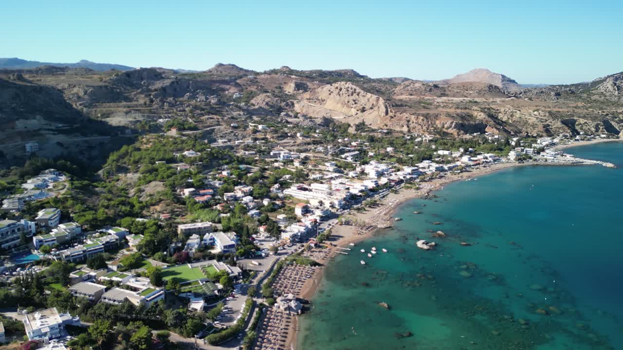 Beautiful Stegna beach aerial drone flyover from high, Rhodes, Greece