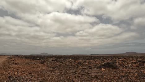 rocky desert landscape under an overcast sky