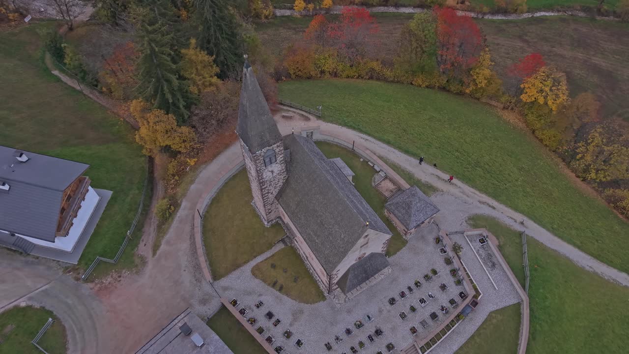 Val di Funes with Santa Maddalena Church on moody day, drone view, Italy