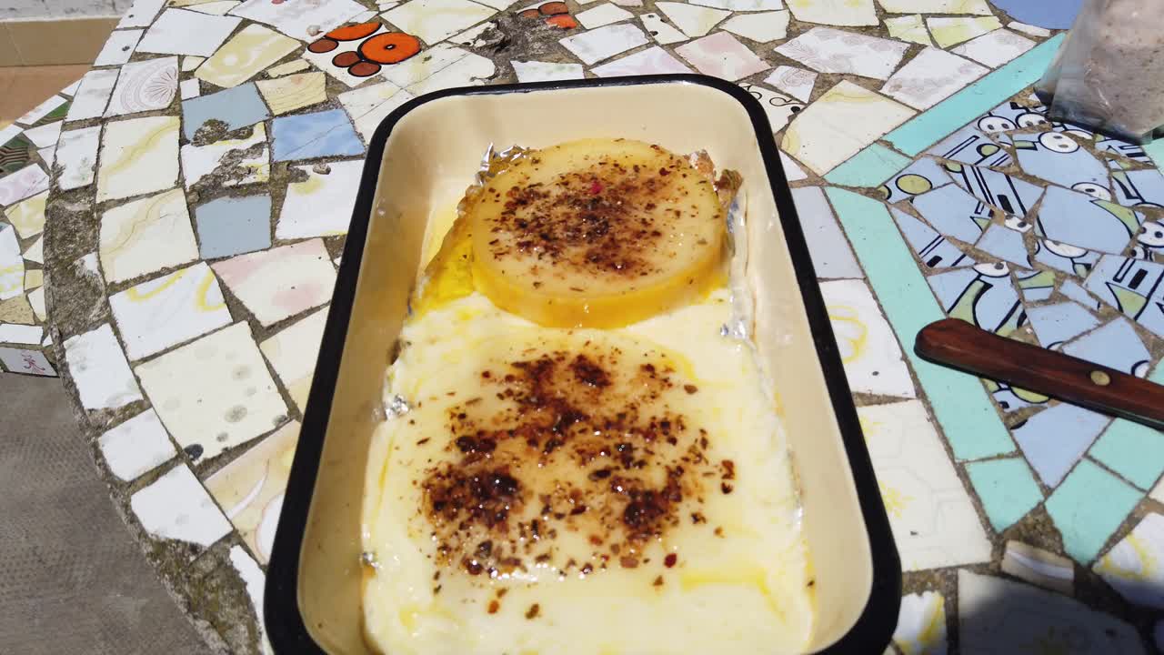 Provoleta, Argentine variant of provolone grilled cheese, Asado traditional barbecue ingredient