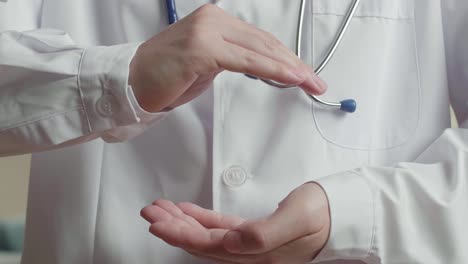medical doctor with two hands in position to protect something , video in 4k
