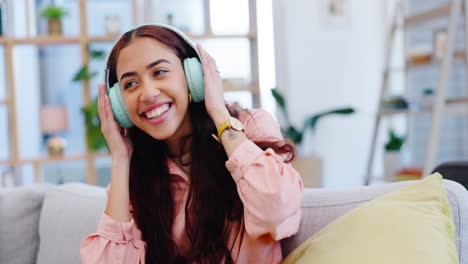 Headphones,-dance-and-woman-with-energy-on-a-sofa