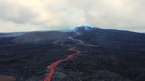 lava flows on an active volcano, mount fagradalsfjall, iceland - aerial drone shot