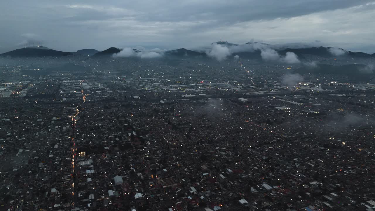 Drone shots of low clouds over Ecatepec during rainy season