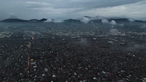 drone shots of low clouds over ecatepec during rainy season