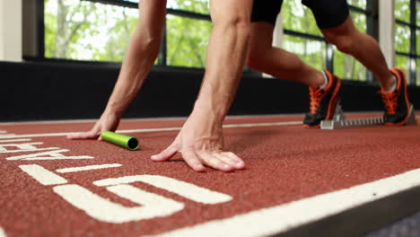 man starting relay running