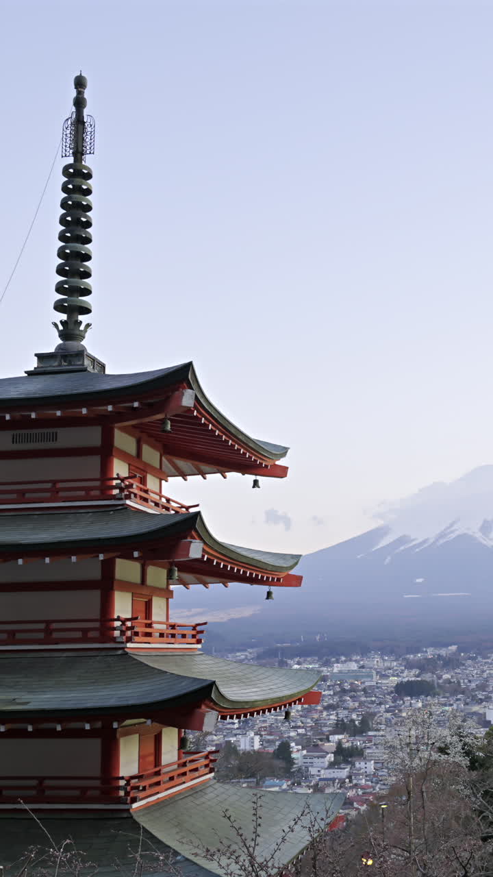 Timelapse view from Chureito Pagoda as the sun sets behind Mount Fuji showcasing breathtaking landscapes