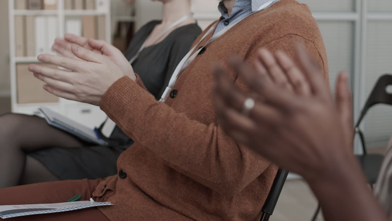Unrecognizable Business People Applauding on Meeting
