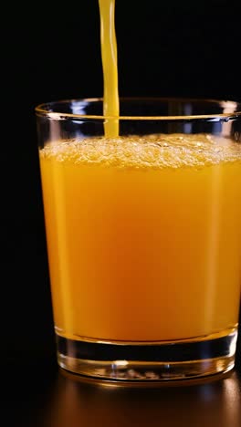 juice being poured into a glass