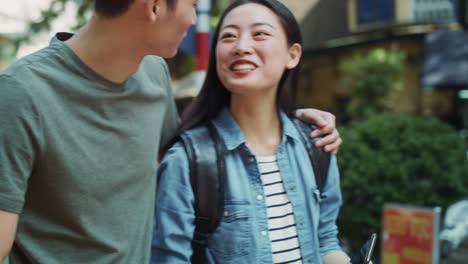 Handheld-view-of-Vietnamese-young-couple-in-the-city