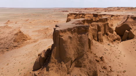 Aerial-View-Of-Bayanzag-Flaming-Cliffs-In-Mongolia---Drone-Shot