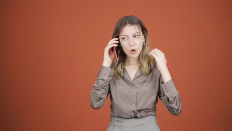 the phone of the young woman talking on the phone runs out of charge.