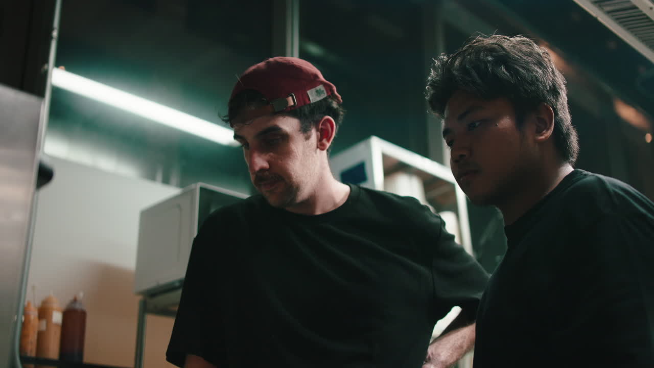 Two chefs in a kitchen