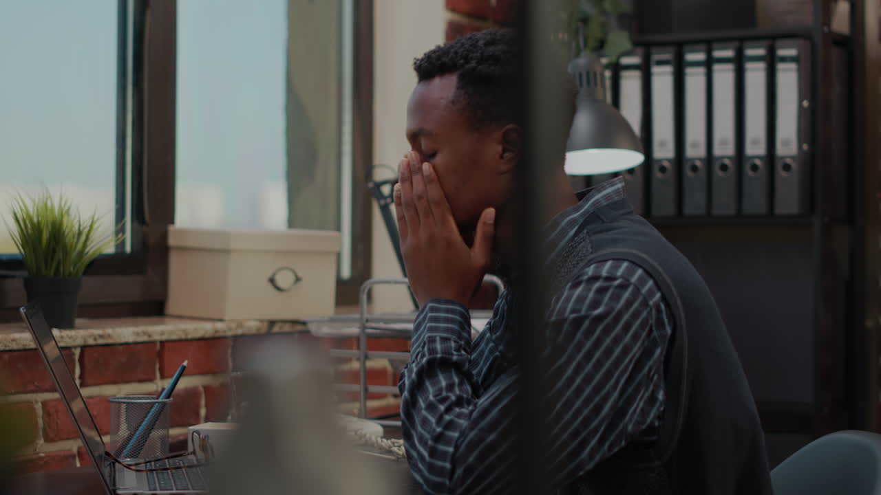 Anxious worker finging put bad news about business project