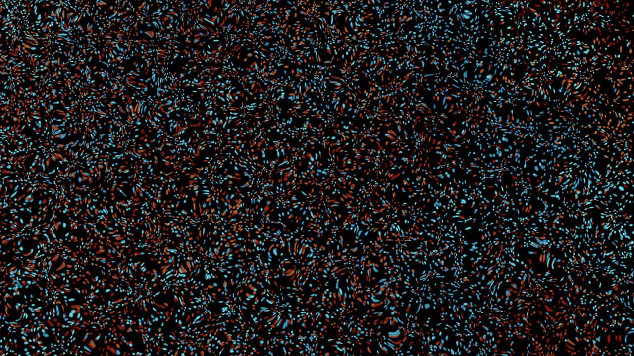 Abstract Organic Particle Movement: Dynamic Flow of Colored Particles on a Dark Background, Subtle Motion and Textural Depth Creating a Sense of Natural, Living Processes