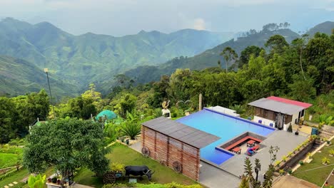 luxury pool villa in tropical mountain landscape. lush greenery and scenic backdrop ideal for travel, real estate, or cinematic lifestyle visuals