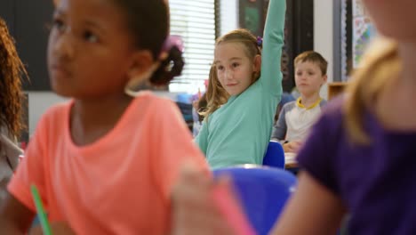 front view of caucasian schoolgirl studying in the classroom 4k